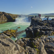 Beautiful vibrant landscape picture of famous Icelandic Waterfall in Iceland