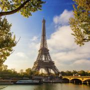 Eiffel Tower with boat on Seine in Paris, France